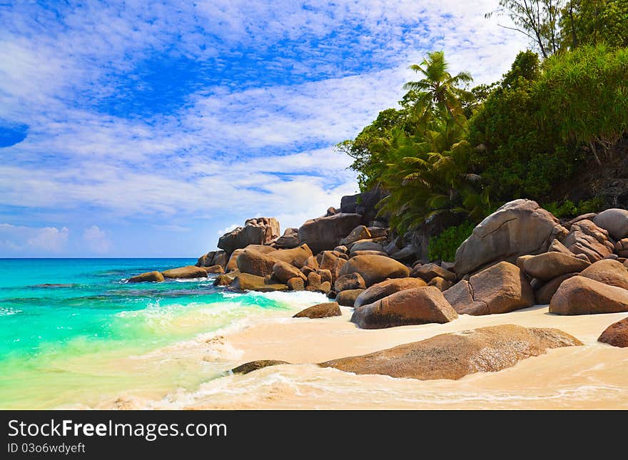 Tropical beach at island Praslin, Seychelles - vacation background