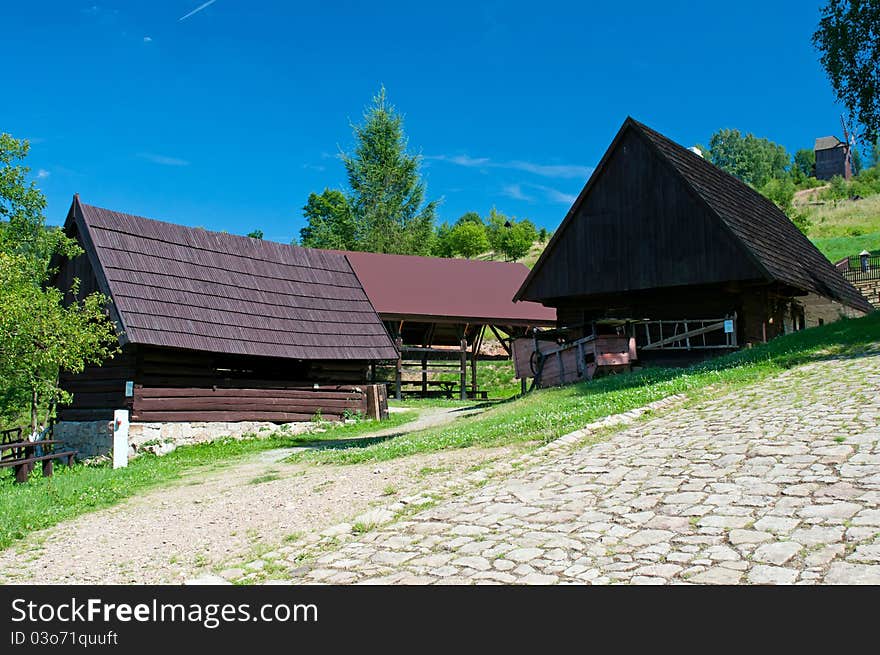 Beautiful historic log houses during the sunny day.