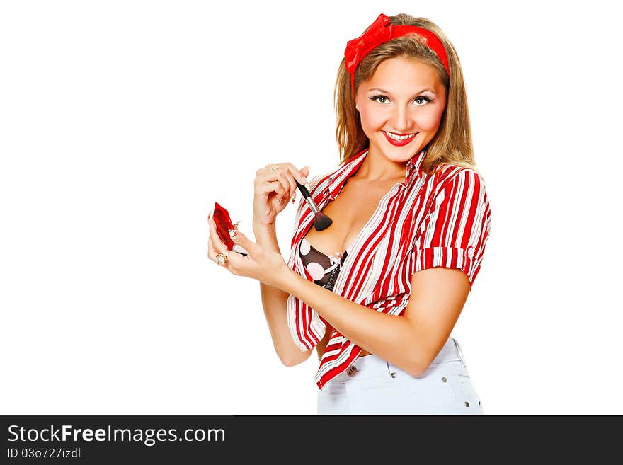 Young, happy girl making his make-up, isolated on a white background. Young, happy girl making his make-up, isolated on a white background.