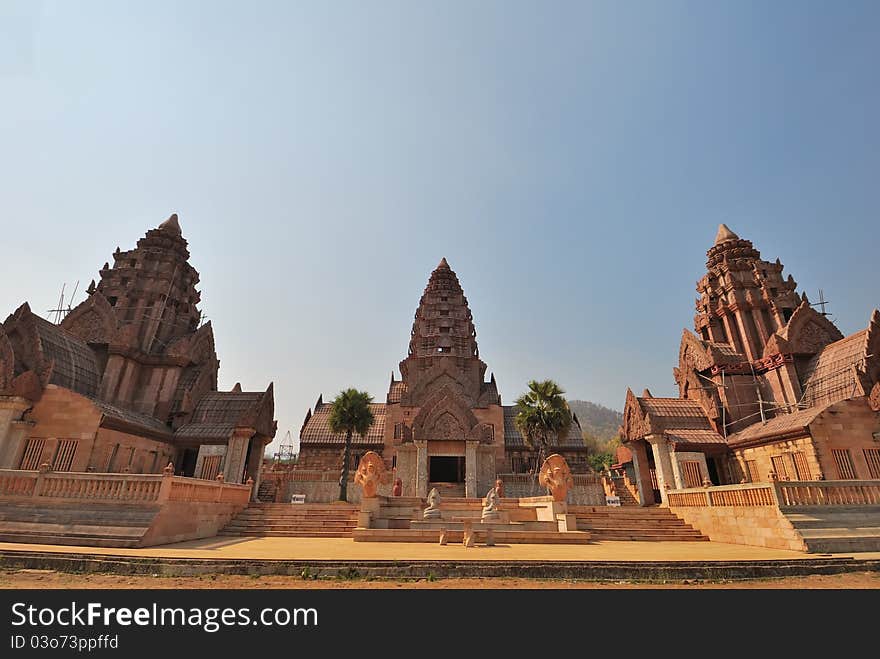 Unique architecture of ancient Thai Buddhist temple built of wood.