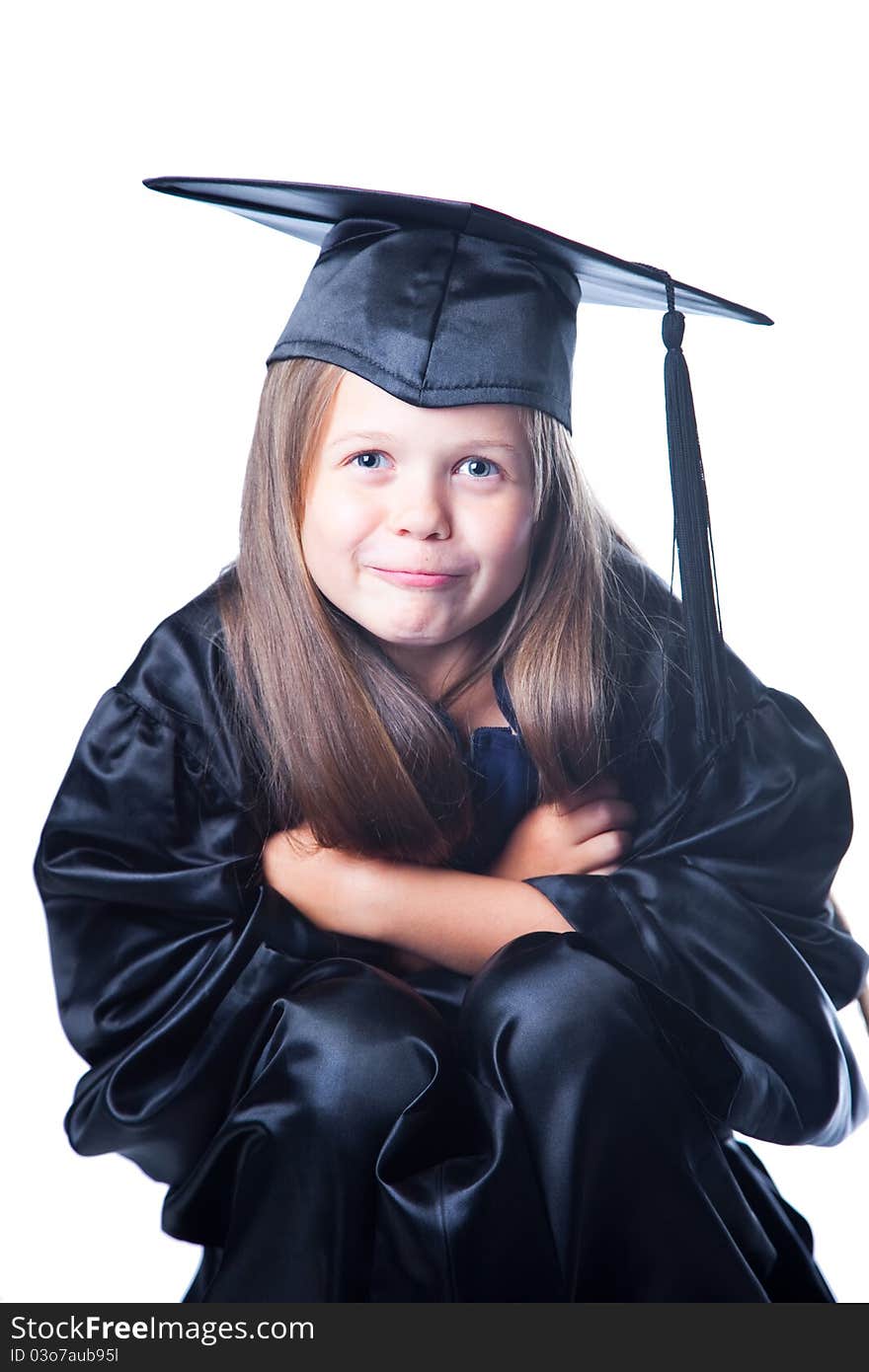 Cute Girl In Graduation Dress On Isolated White