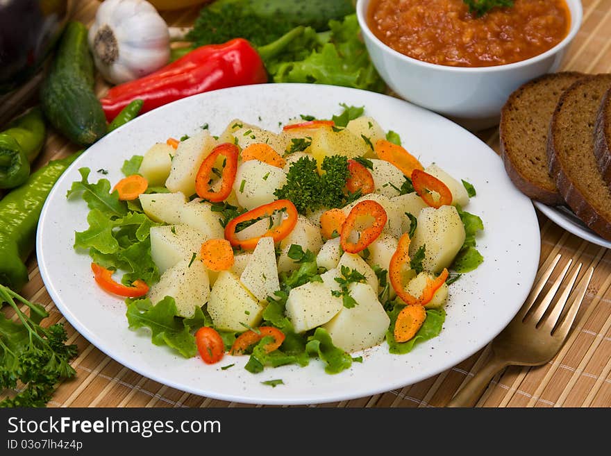 Boiled potatoes with vegetables