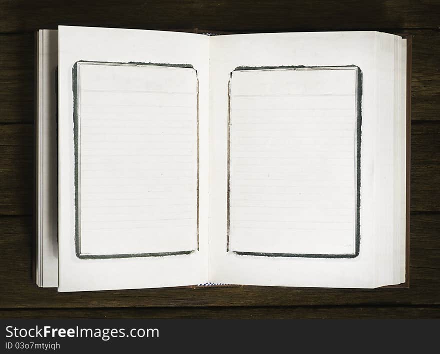 Blank paper on wood background. Blank paper on wood background