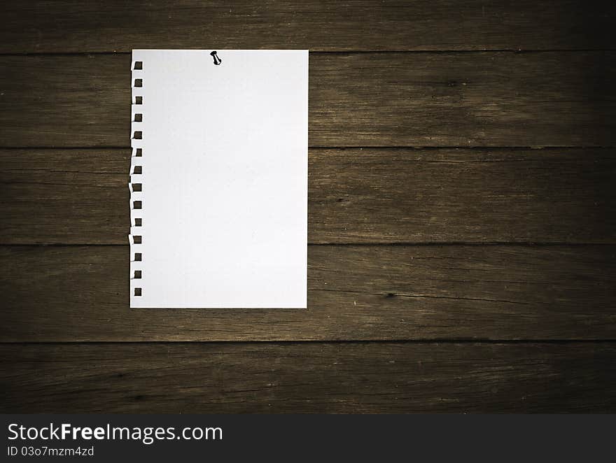 Blank paper on wood