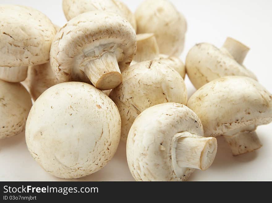 Fresh mushrooms on white background