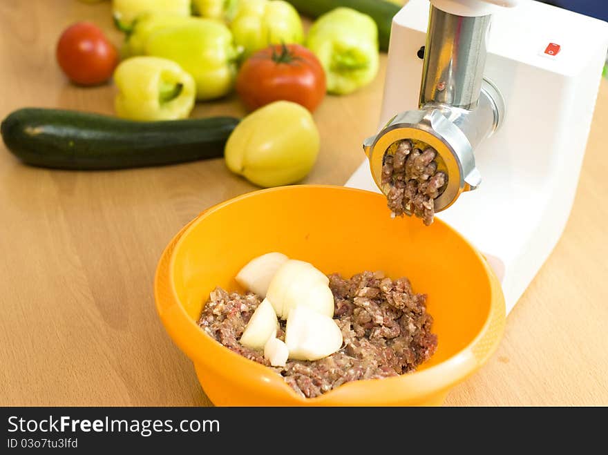 Meat through a meat grinder for force meat