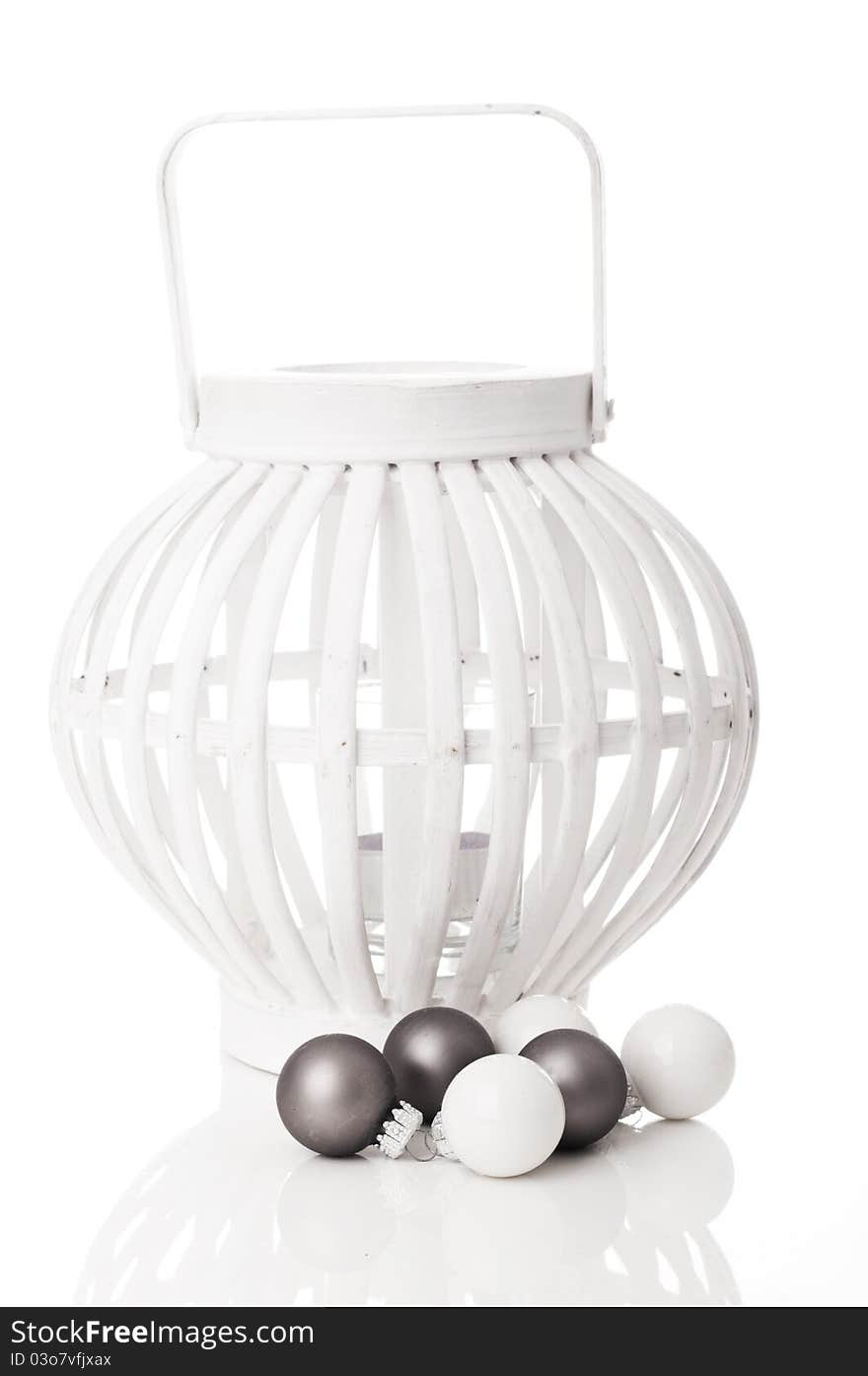 One white decoration lantern with Xmas balls taken in studio for cutout with a white background.