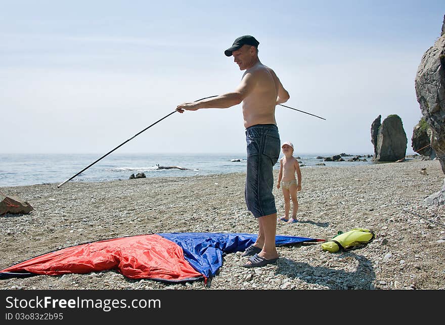 Father and daughter on the beach