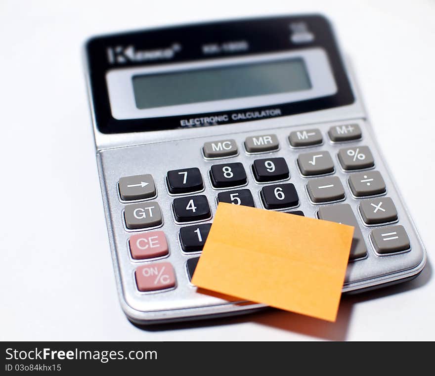 This is an image of calculator with blank paper.