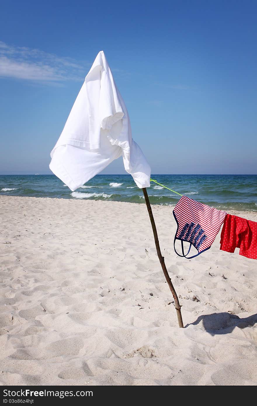 Shirts drying on the beach