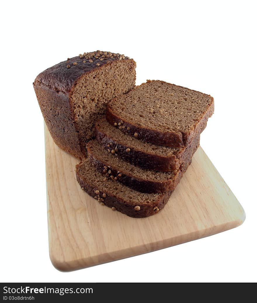 Brown bread slices wooden cutting board on a white background