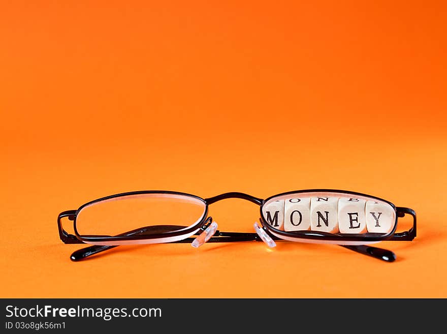 Glasses with money lettering