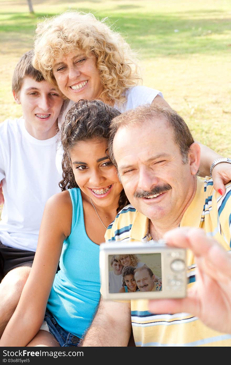 Happy Family Taking Self Portrait