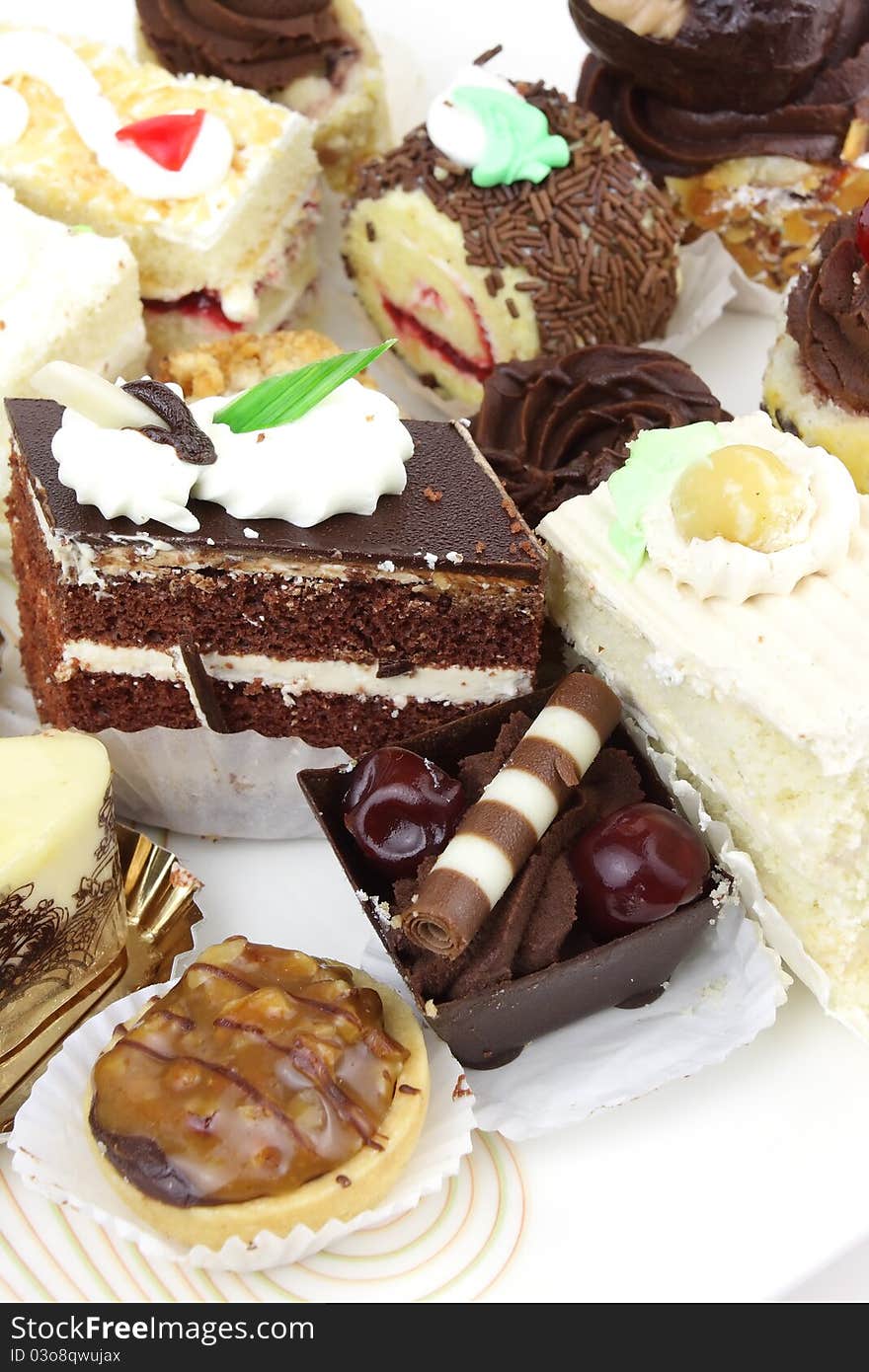 Colorful pastries with cream caramel and chocolate