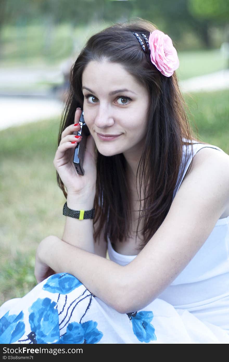 Young Woman Talking On The Phone