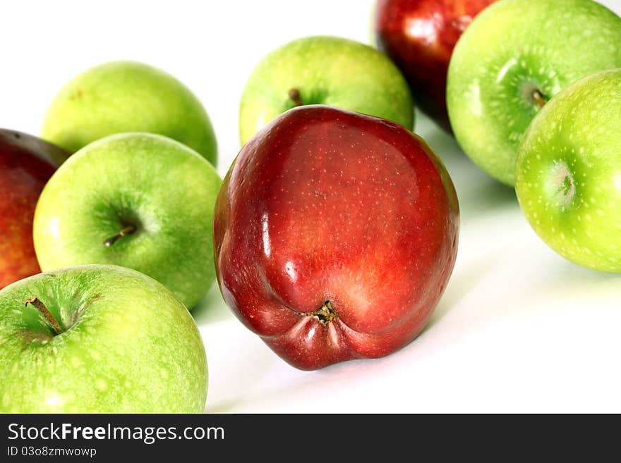 Red and green apples macro close up