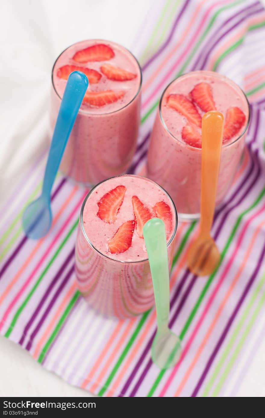 Fresh cold strawberry smoothies with fresh fruits