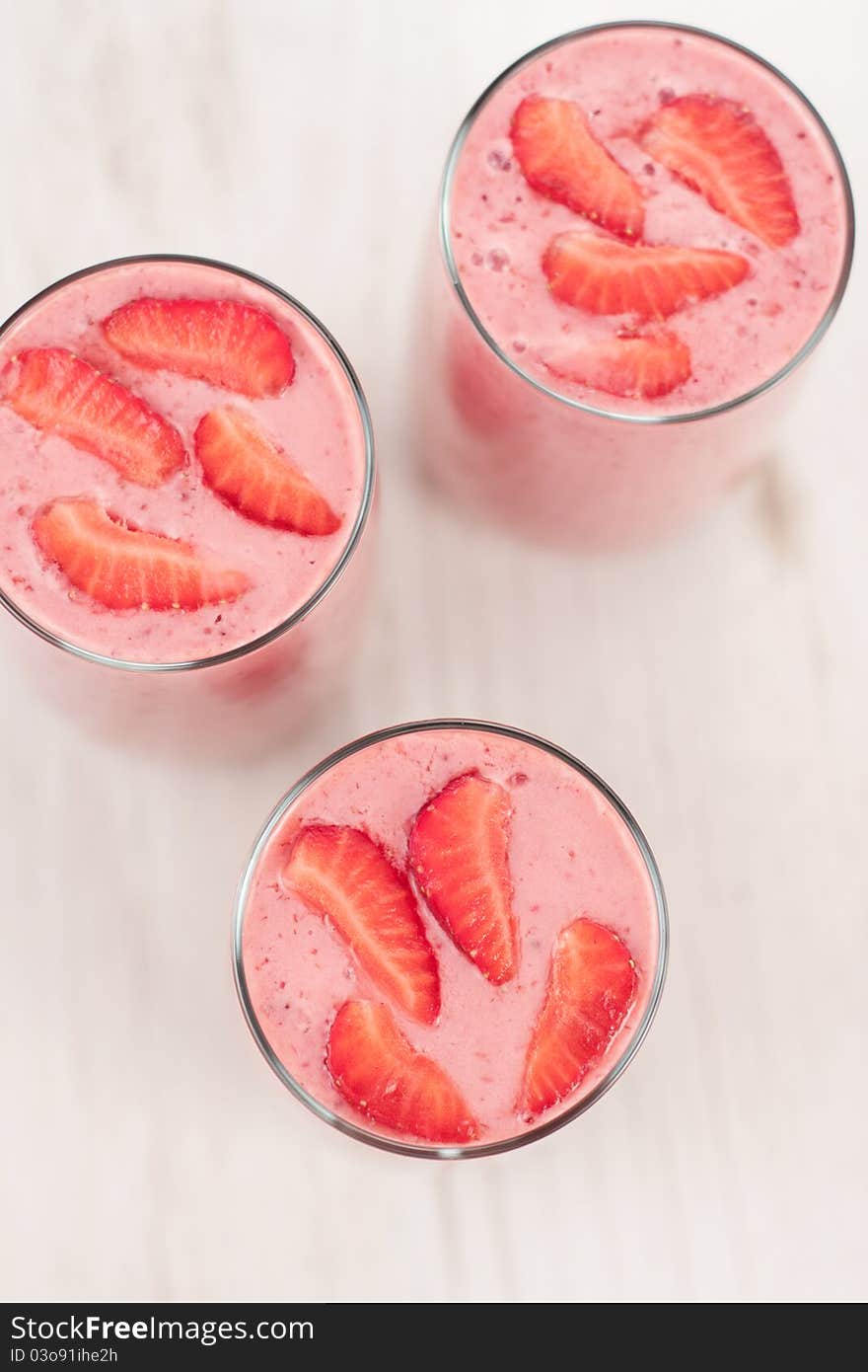 Fresh cold strawberry smoothies with fresh fruits