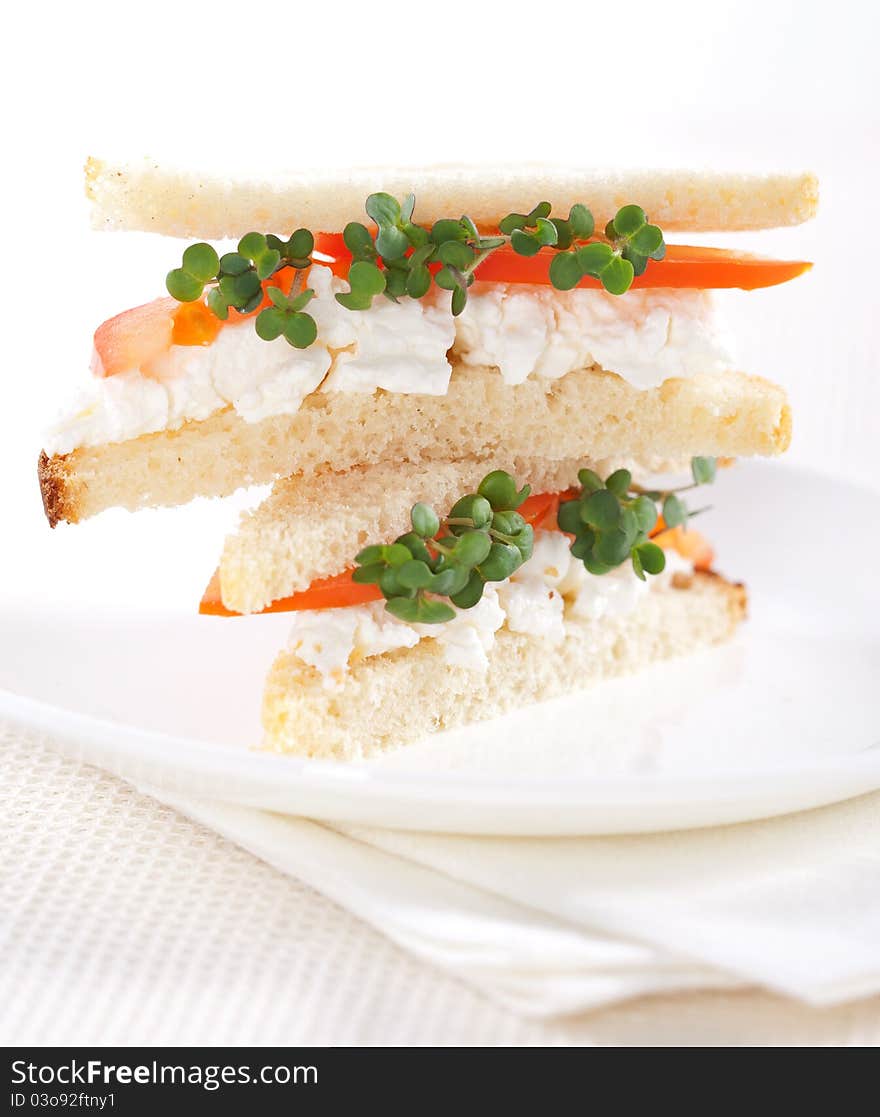 Vegetarian sandwiches with cottage cheese, tomatoes and mustard sprouts