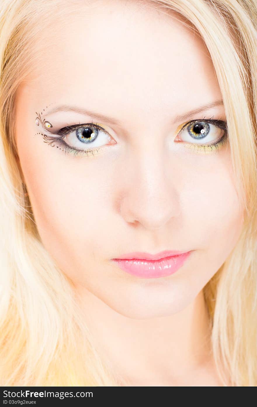 Young Beautiful Blonde Woman With Make-up