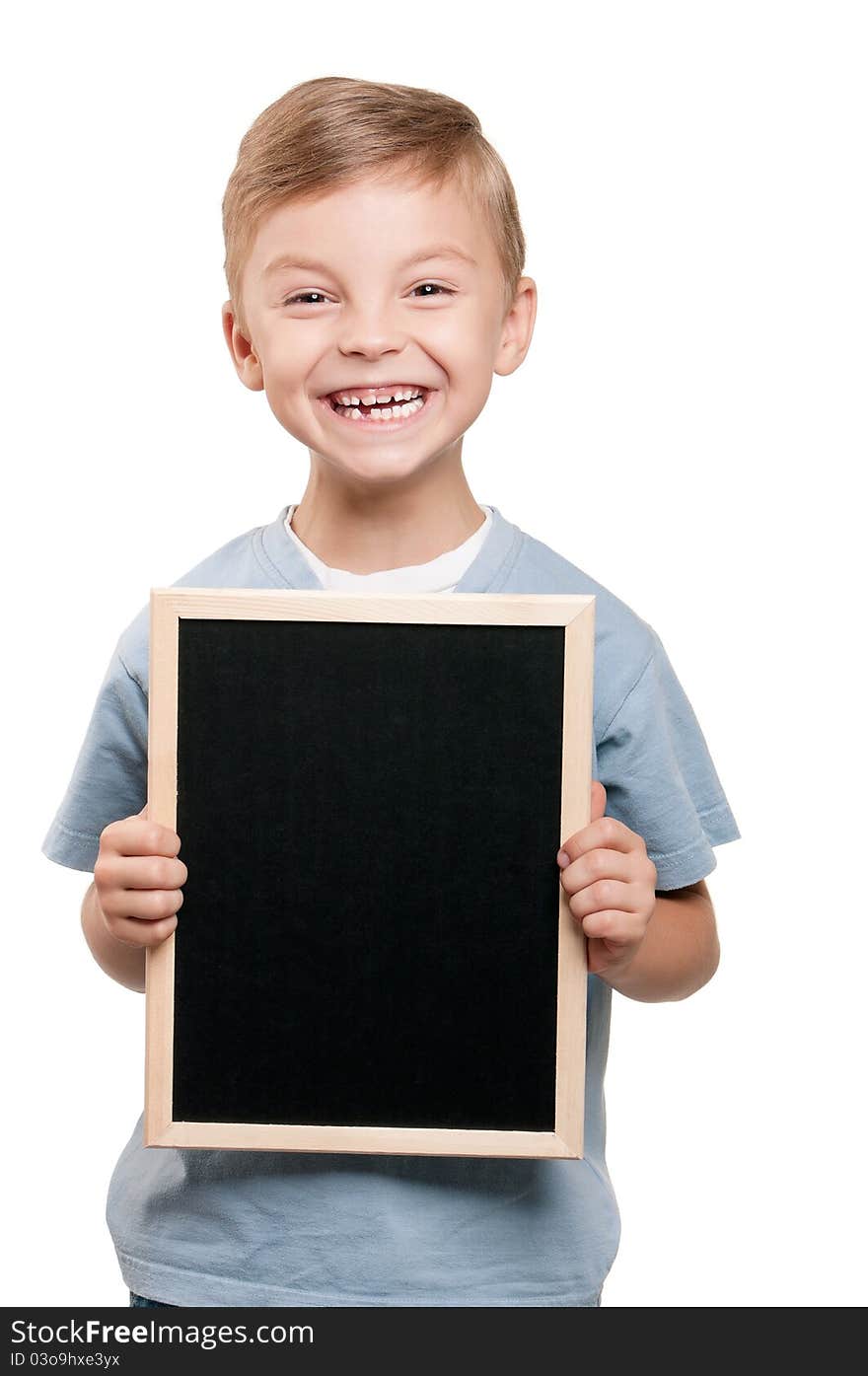 Portrait of a little boy holding a blackboard over white background. Portrait of a little boy holding a blackboard over white background