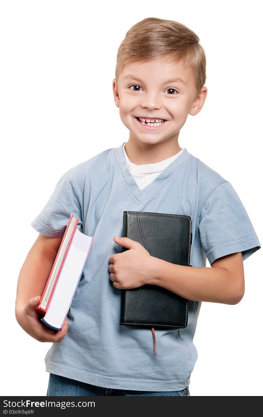 Portrait of a funny little boy holding a books over white background. Portrait of a funny little boy holding a books over white background