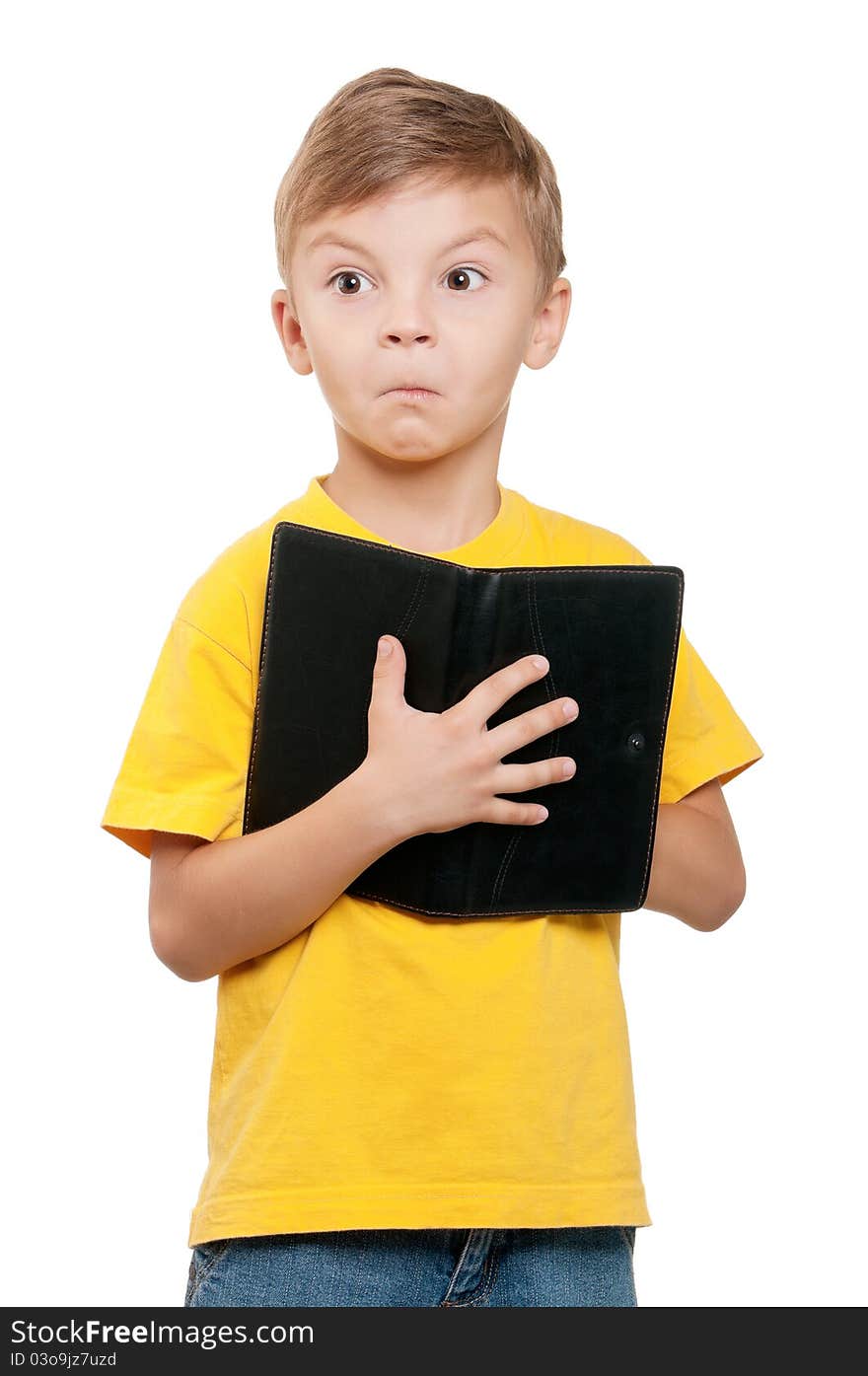 Portrait of little schoolboy with book on white background. Portrait of little schoolboy with book on white background