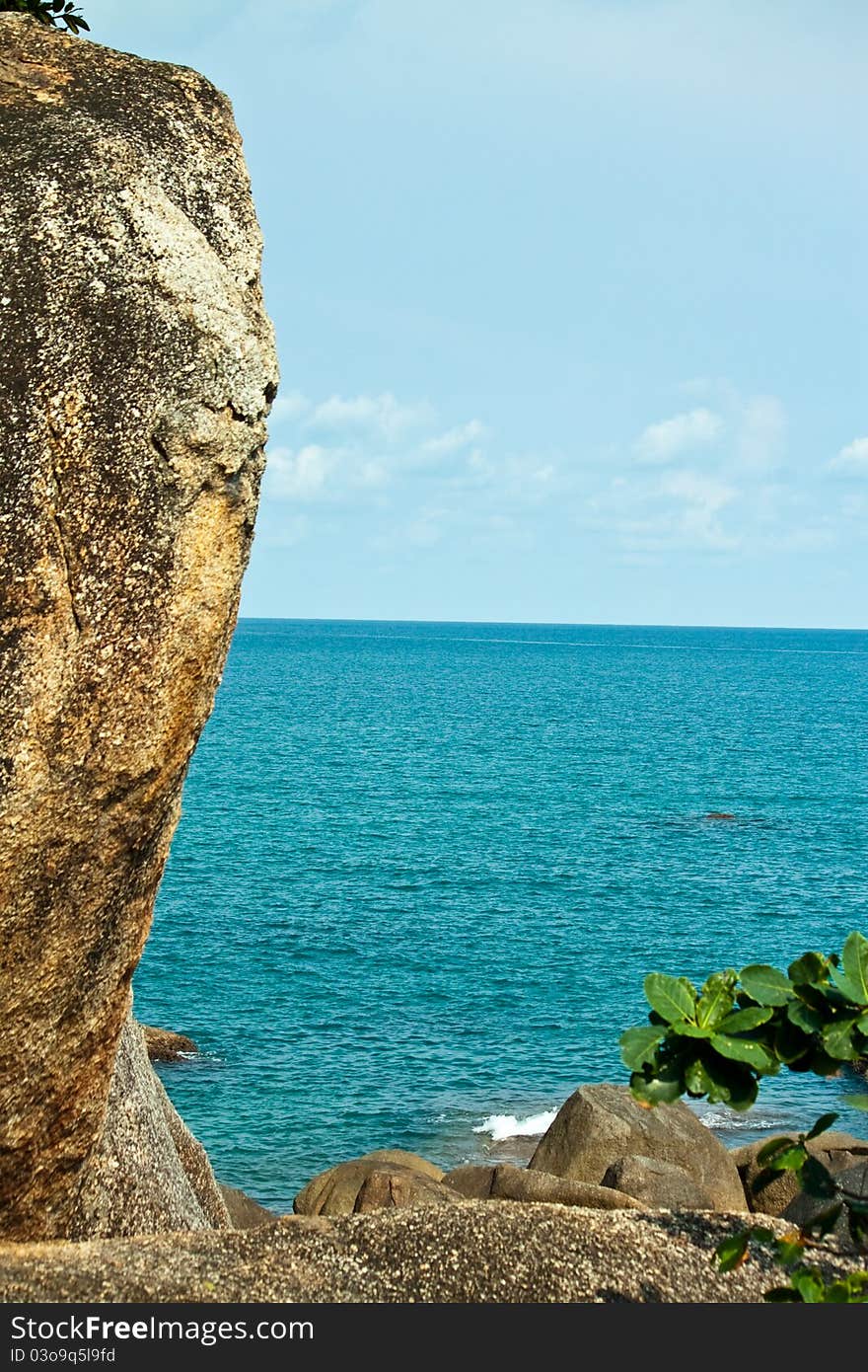 Rock and blue sea