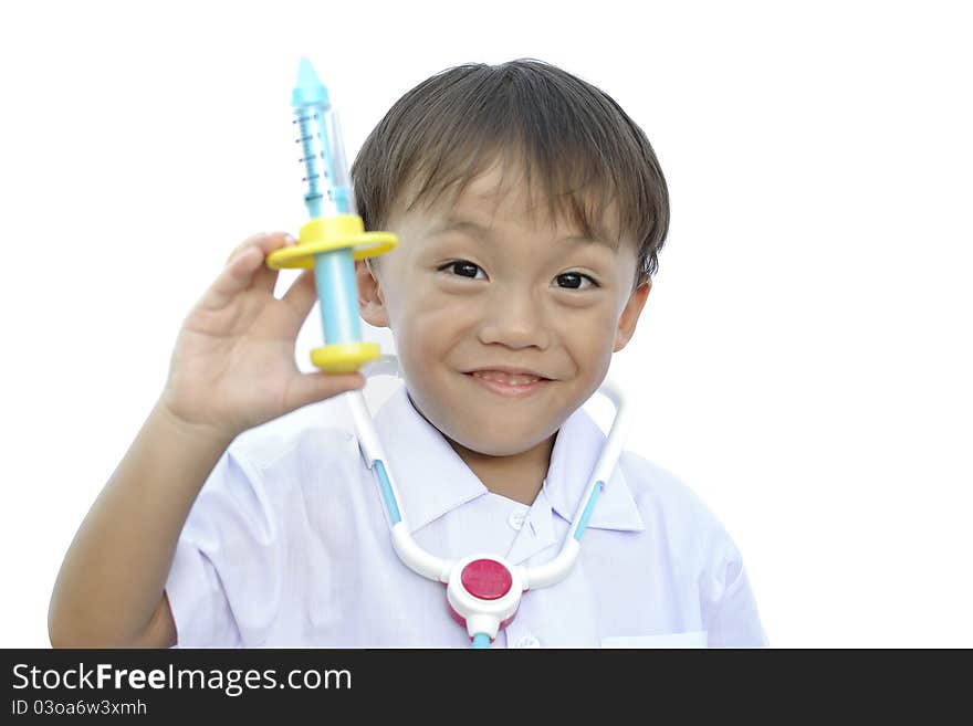 Young asian boy in doctor uniform on white background.