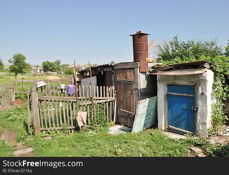 A foto of rural life with pieces of home-related items, such as shower and cellar. A foto of rural life with pieces of home-related items, such as shower and cellar.