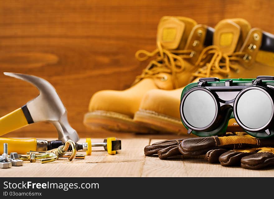 Goggles On Glowes With Other Tools