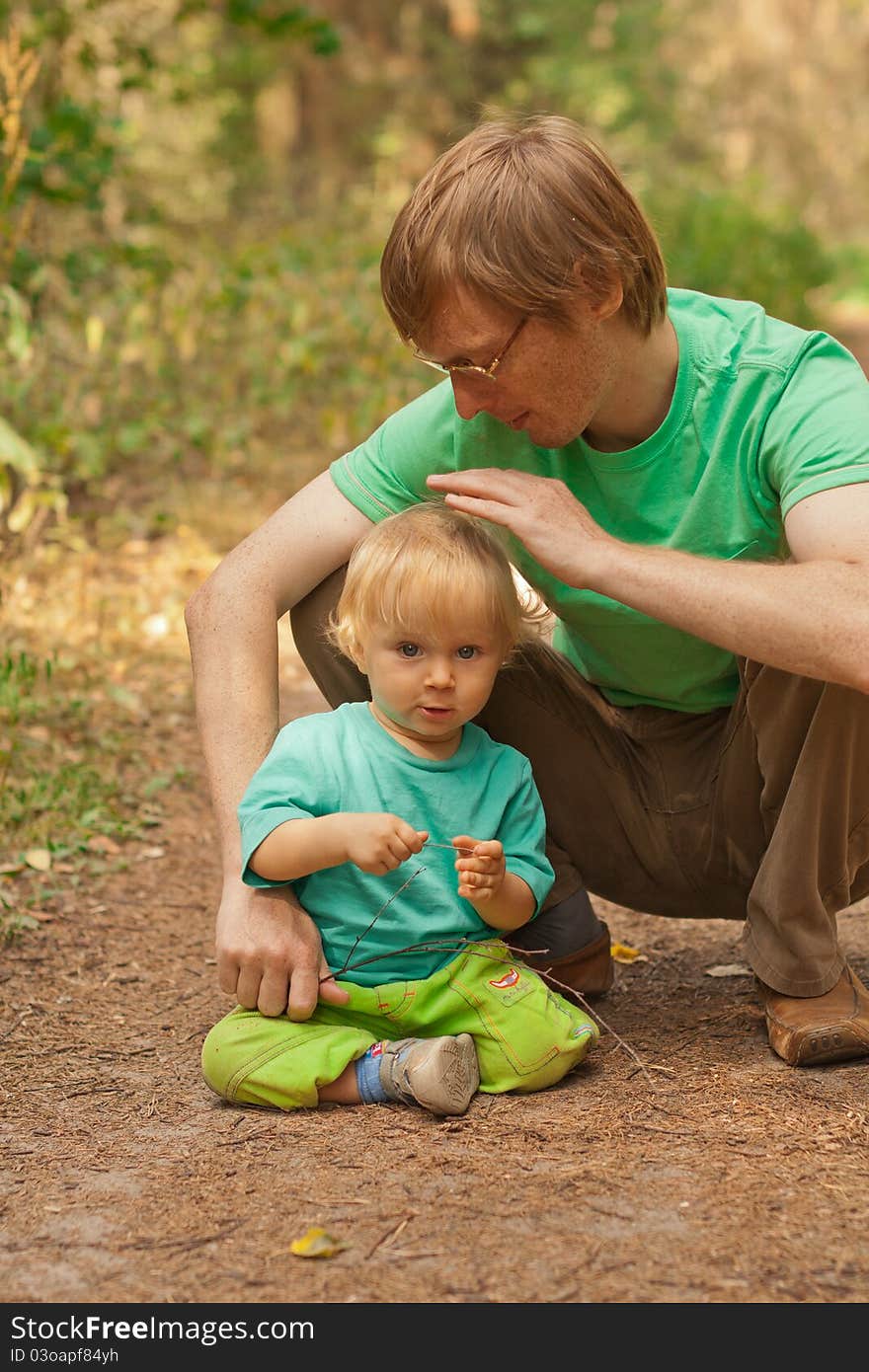 Good boy with father in summer nature