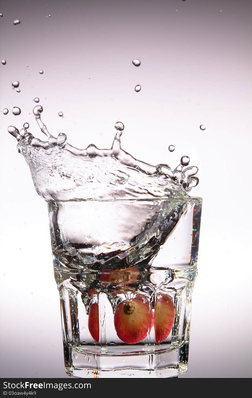 A Fruit drop in water. A Fruit drop in water.