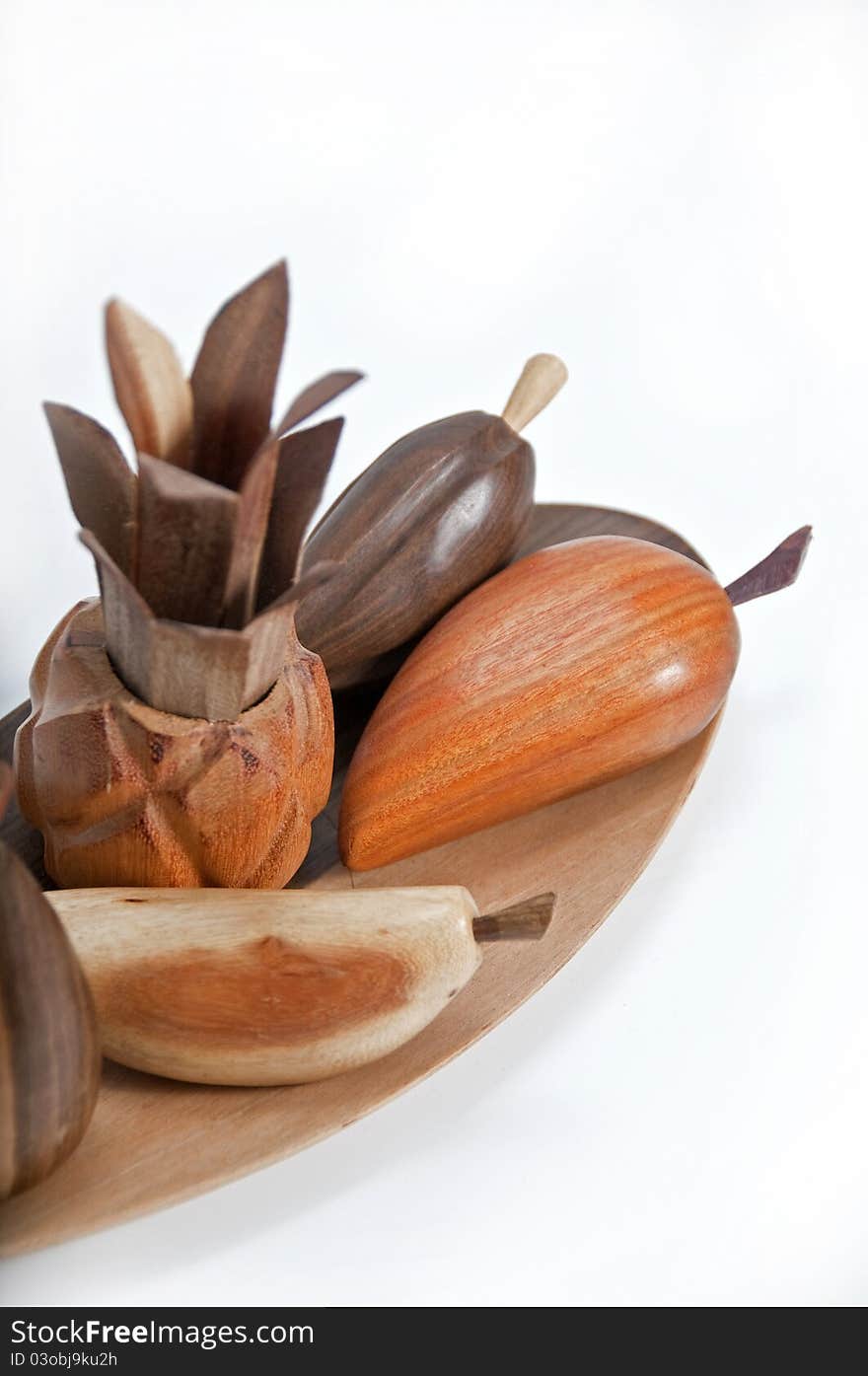 picture of wooden fruits for decoration has more than enough white bottom