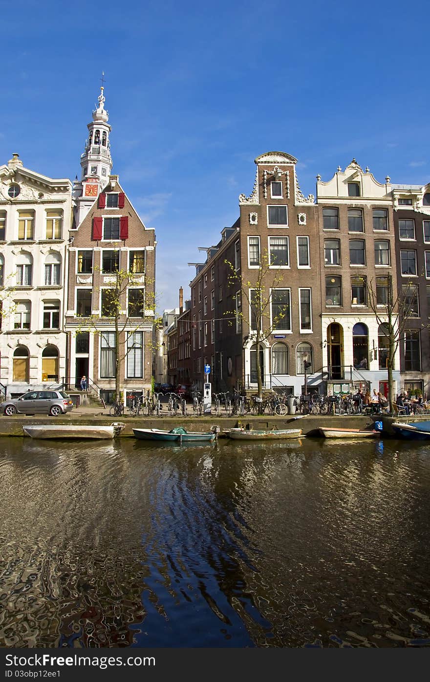 Amsterdam Life. Residential homes on the canal. Urban scene. Spring. Amsterdam Life. Residential homes on the canal. Urban scene. Spring.