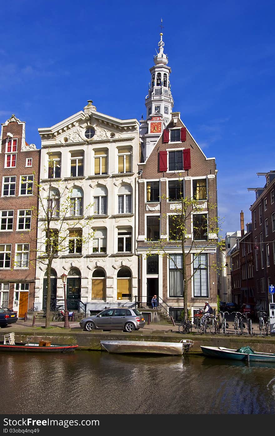 Amsterdam Life. Residential homes on the canal. Urban scene. Spring. Amsterdam Life. Residential homes on the canal. Urban scene. Spring.