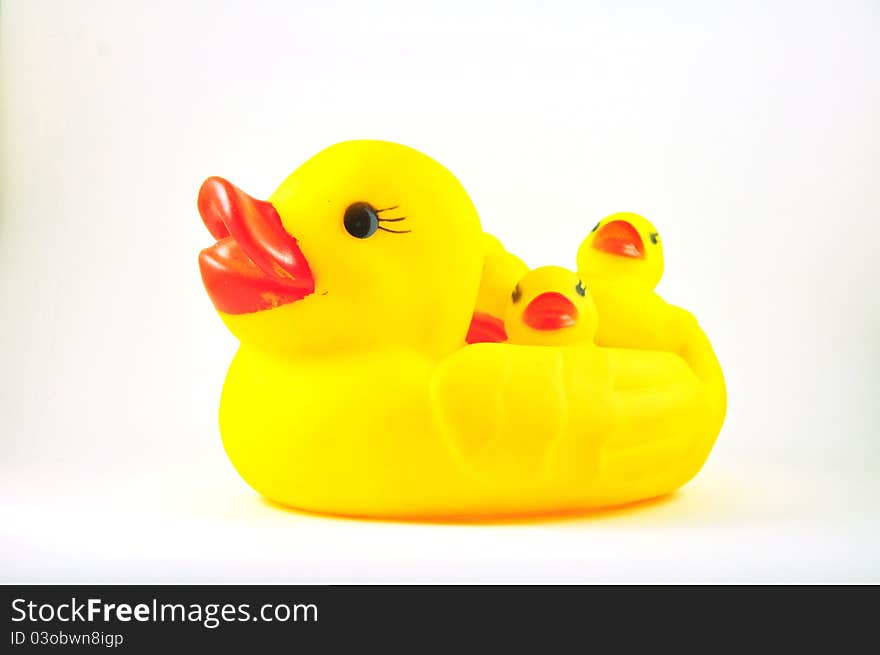 The yellow duck toy on white background