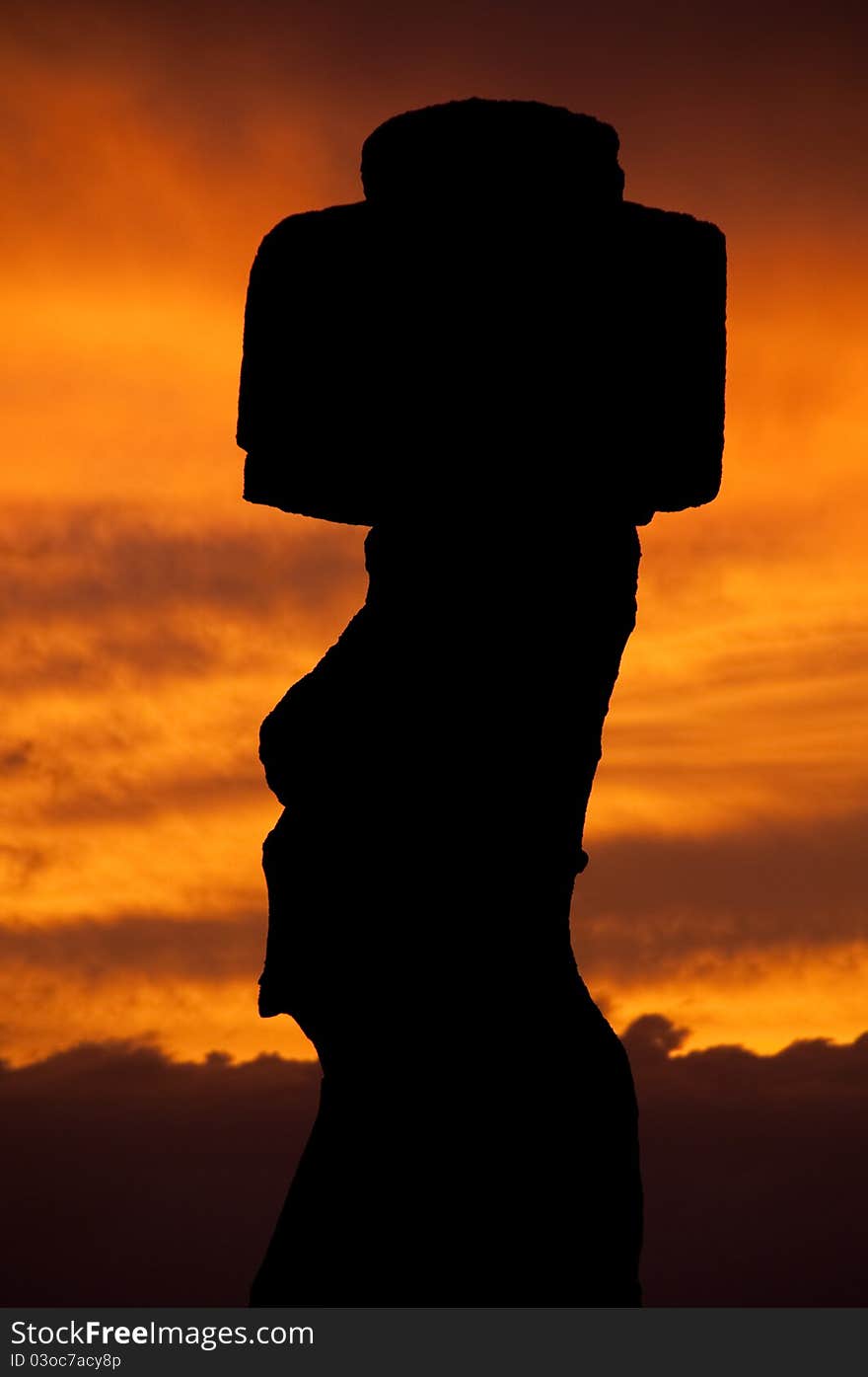 Sunset in Rapa Nui, shadow of a moai