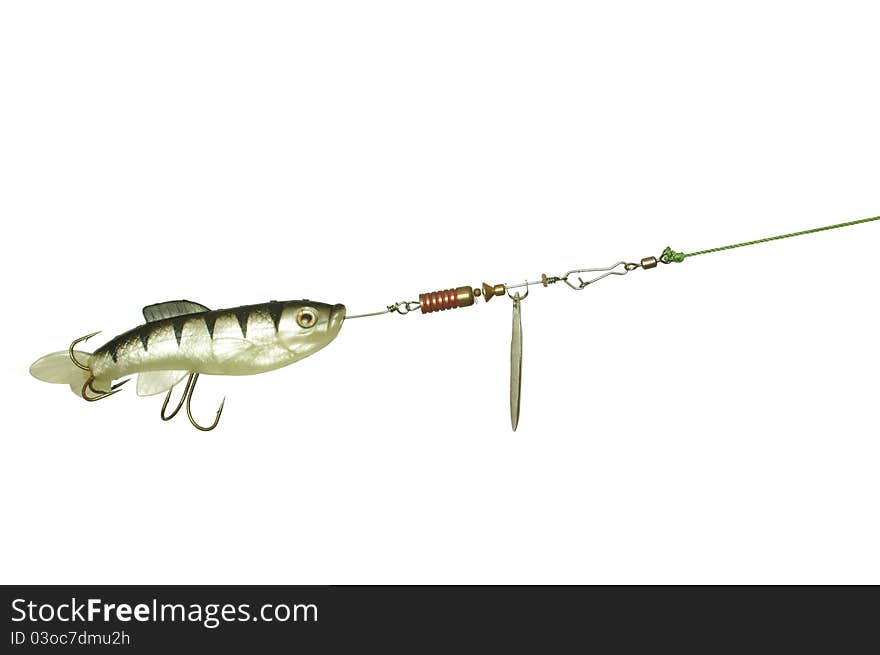 Gum and metal angling bait on white background