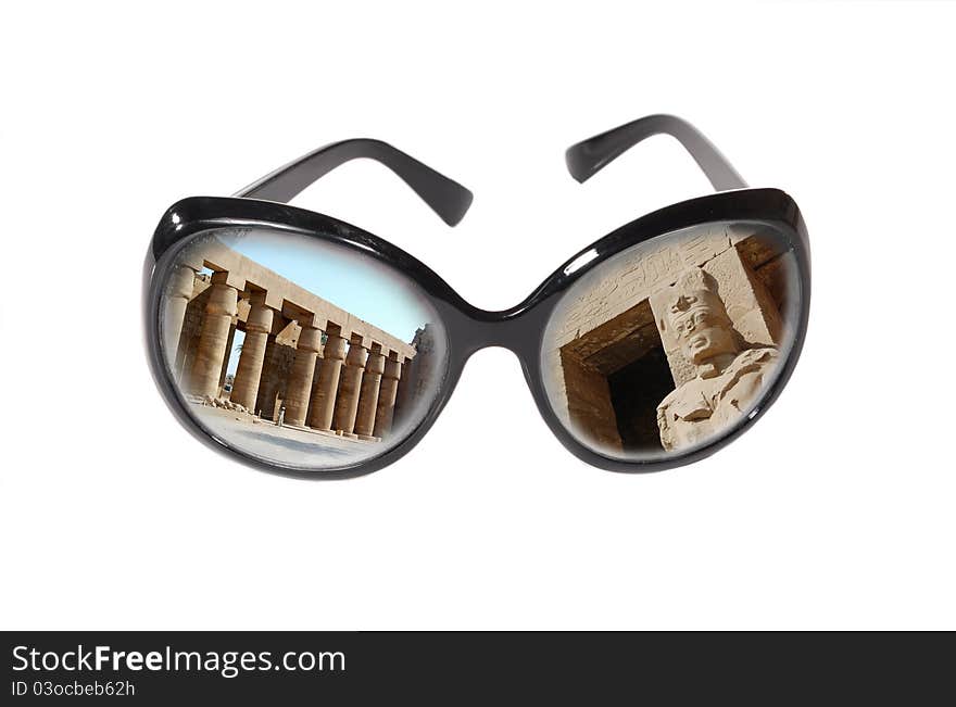 Monuments of Egypt are reflected in dark glasses. Monuments of Egypt are reflected in dark glasses