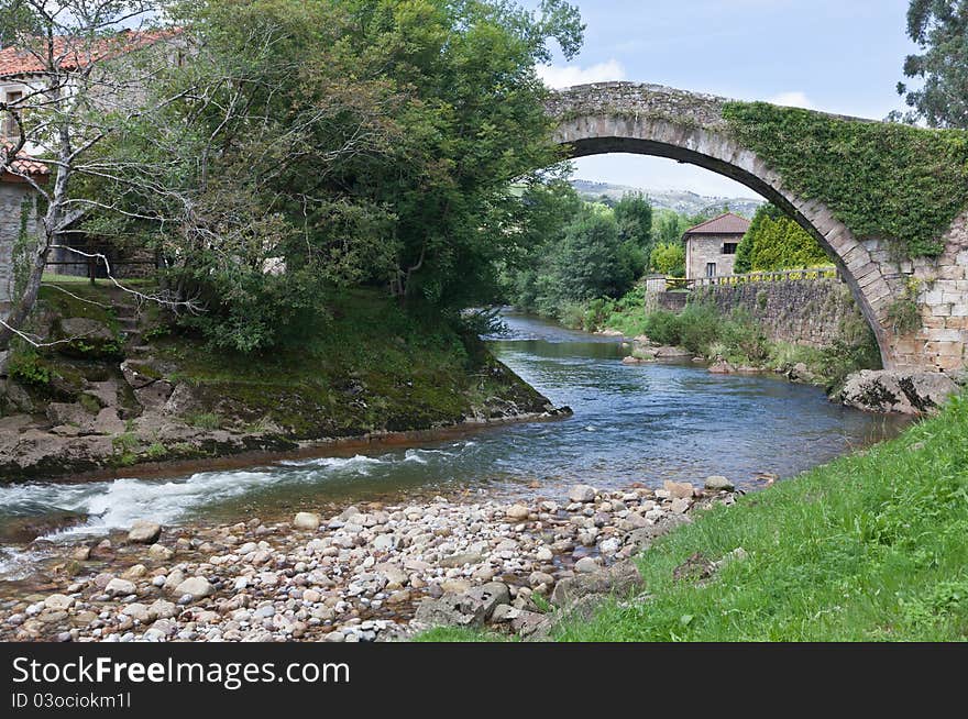 Medieval bridge over a river in the province of Cantabria in northern Spain. Medieval bridge over a river in the province of Cantabria in northern Spain