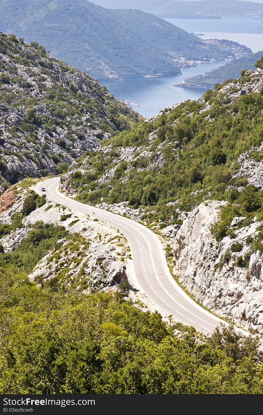 Aerial view on hairpin road to Risan. Montenegro. In background bay of Kotor. Aerial view on hairpin road to Risan. Montenegro. In background bay of Kotor.