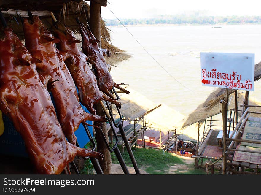 Roasted pig suckling and shelter for sitting. Roasted pig suckling and shelter for sitting.