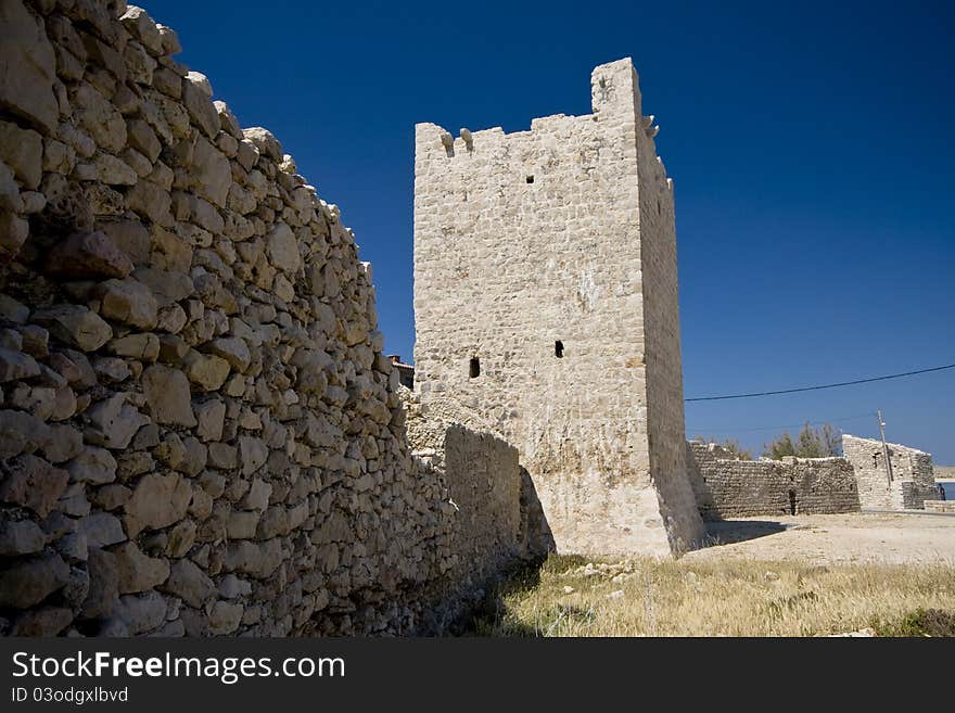 Medival stonemade tower and the stonewall in Razanac