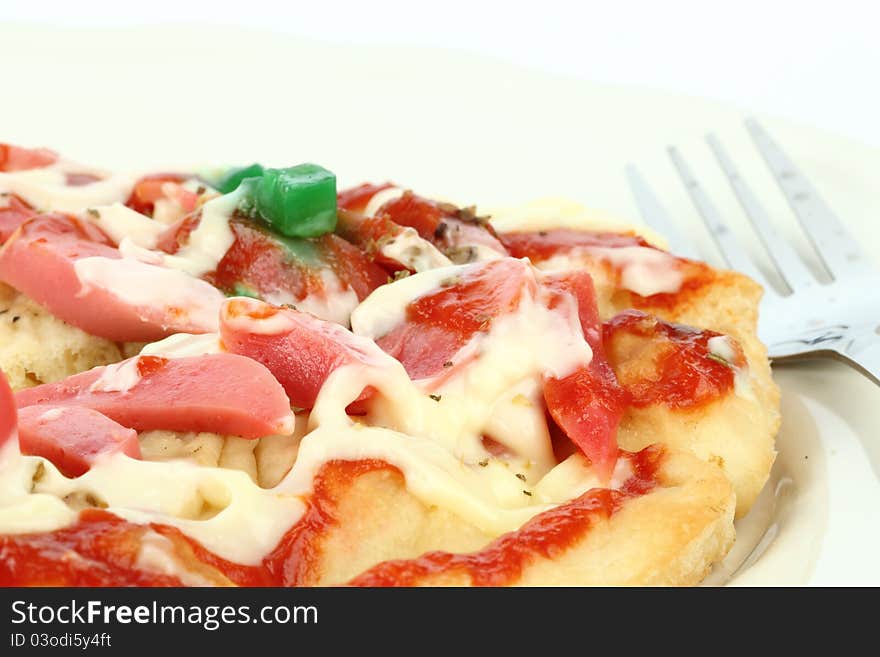 Pizza with fork on white background