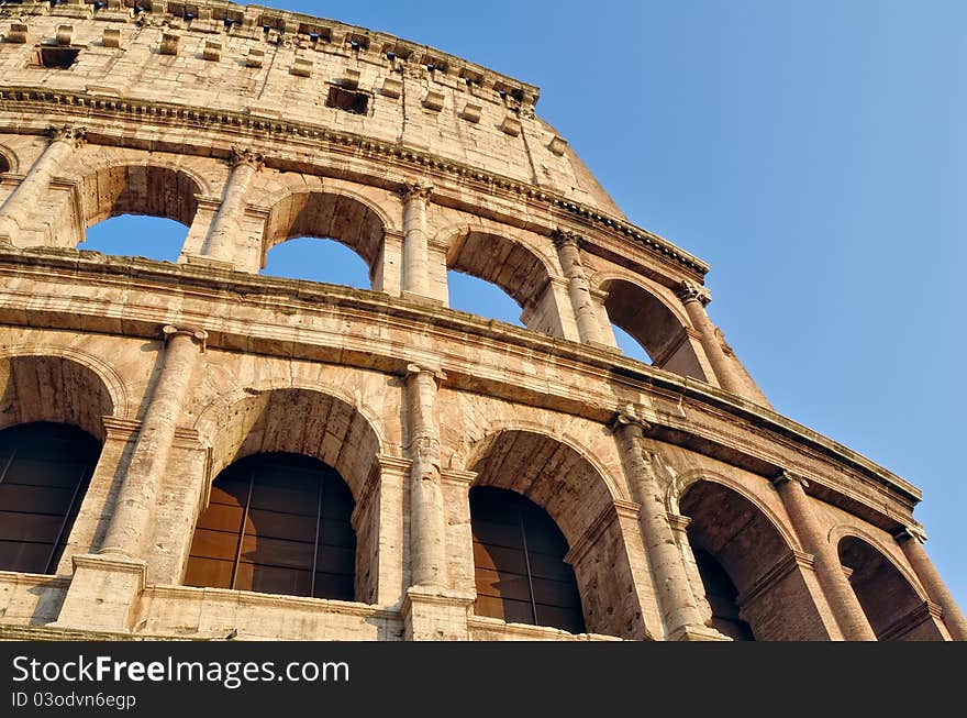 Ancient ruins Roman Colosseum. View from side. Ancient ruins Roman Colosseum. View from side