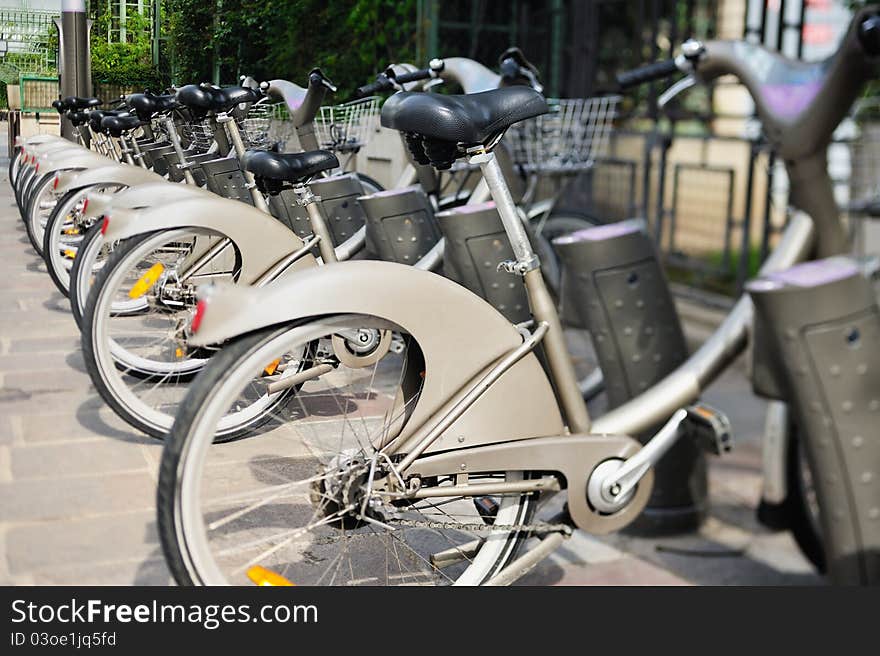 Parking of bicycles in Paris. Photo with tilt-shift lens. Parking of bicycles in Paris. Photo with tilt-shift lens