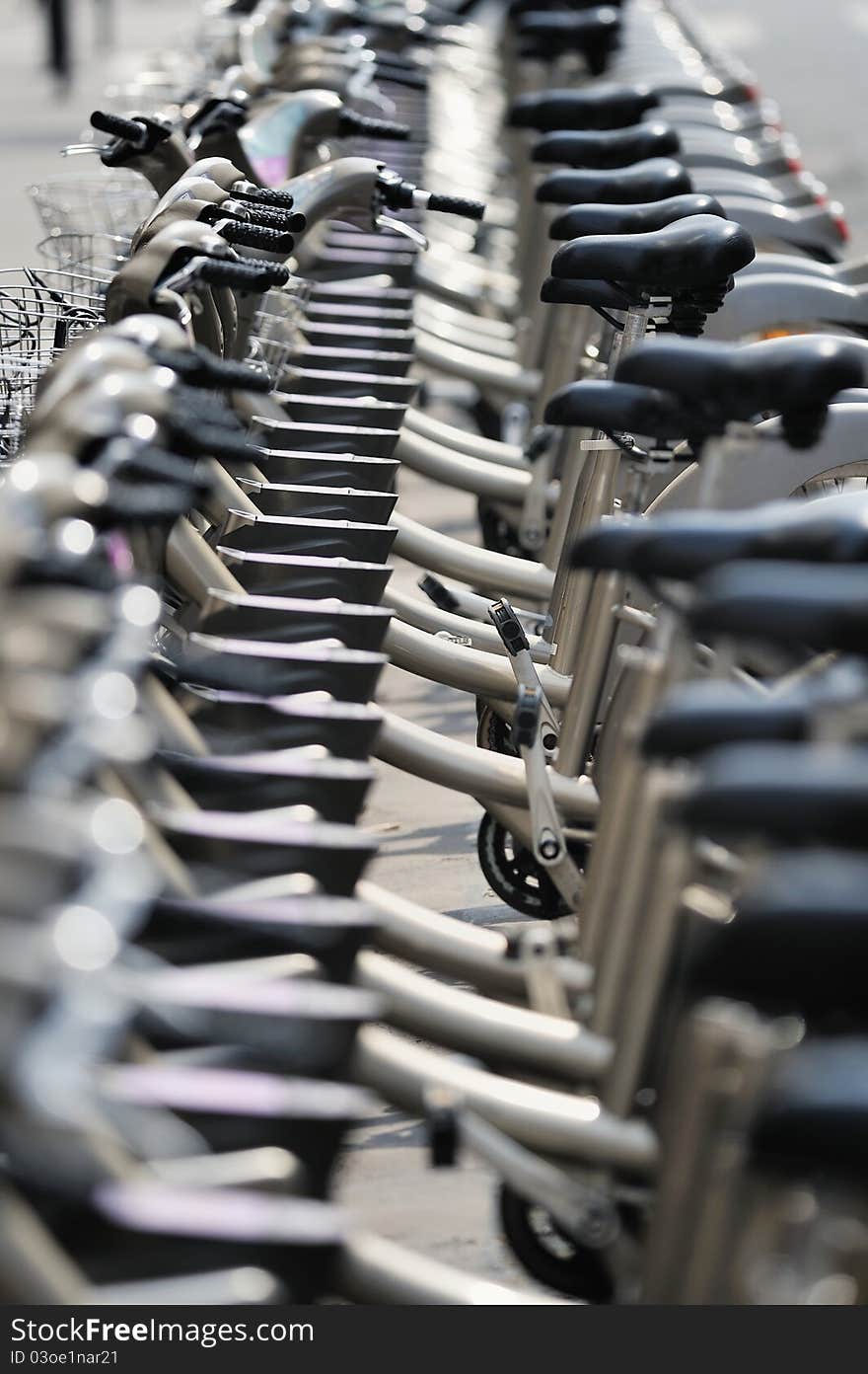 Row of bicycles on the parking. Photo with tilt-shift lens. Row of bicycles on the parking. Photo with tilt-shift lens