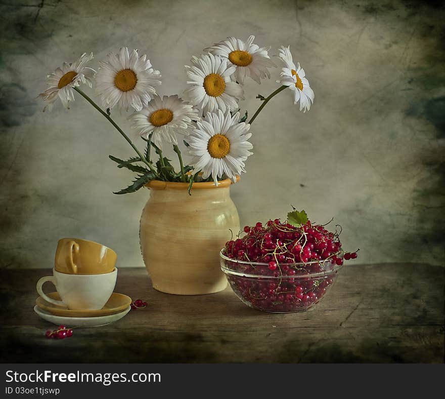 Still life with camomiles and red currant