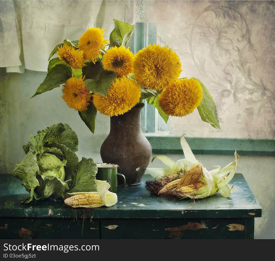 Still life with the bouquet of sunflowers, cabbage and corn. Still life with the bouquet of sunflowers, cabbage and corn